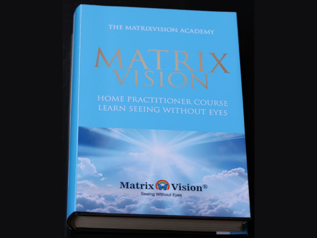 The MatrixVision Home Practitioner Course workbook, a blue hardcover book.